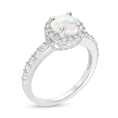 Oval Opal and 1/15 CT. T.W. CZBy pass Split Shank Ring in Sterling Silver